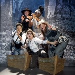 MEN ON BOATS. Photo by Elke Young.