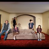 The cast of THE FAMILY DOG. (L to R) Brendan George, Andrew Garman, Bruce McKenzie, Talene Monahon, Sarah Steele, Jennifer Van Dyck and Ethan Dubin